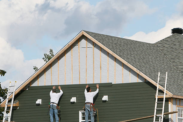 Professional Siding Installation technician working in Spring Grove, VA